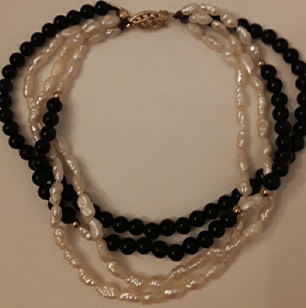 Vintage four strand bracelet with Oynx, rice pearl, 14k beads and clasp